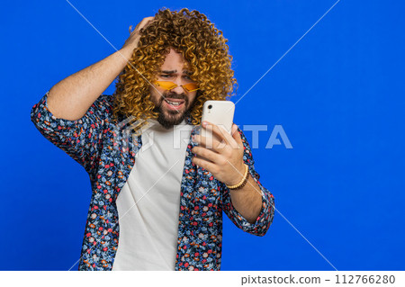 Upset sad man use smartphone play game, loses, loss fail unlucky news, bad lottery results, crisis 112766280