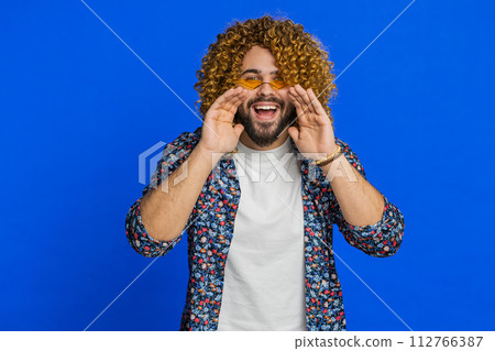 Happy man yell shout scream loud to camera promotion advertisement sale invitation greetings Happy man yell shout scream loud to camera promotion advertisement sale invitation greetings 112766387