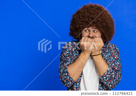 Scared fearful depressed young man suffering phobia, anxiety disorder, expresses fear, stress panic Scared fearful depressed young man suffering phobia, anxiety disorder, expresses fear, stress panic 112766421