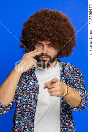 Man pointing at his eyes and camera show I am watching you gesture spying watching on someone Man pointing at his eyes and camera show I am watching you gesture spying watching on someone 112766456