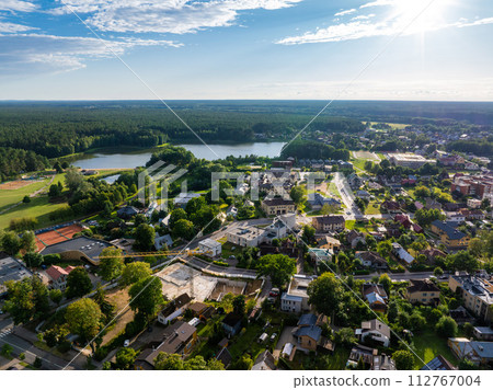Aerial panoramic view of Lithuanian resort Druskininkai. Druskininkai in autumn colours, drone picture of multi coloured trees in most beautiful city of Druskininkai in Lithuania Aerial panoramic view of Lithuanian resort Druskininkai. Druskininkai in autumn colours, drone picture of multi coloured trees in most beautiful city of Druskininkai in Lithuania 112767004