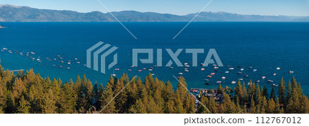 Beautiful aerial view of the Tahoe lake from above in California, USA. Wild forests, fresh air and mountains of California. 112767012