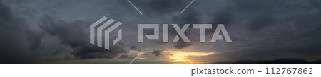Panoramic View of Cloudscape during a colorful sunset or sunrise. Panoramic View of Cloudscape during a colorful sunset or sunrise. 112767862