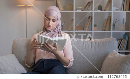 Book leisure home smart woman reading story couch Book leisure home smart woman reading story couch 112768455