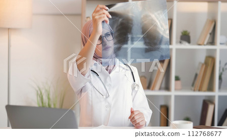 Doctor office medical expertise woman x-ray film 112768677
