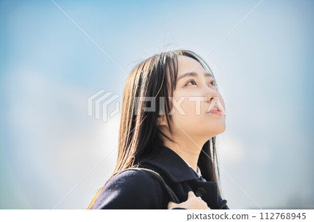 High school girls looking to the future under the blue sky High school girls looking to the future under the blue sky 112768945