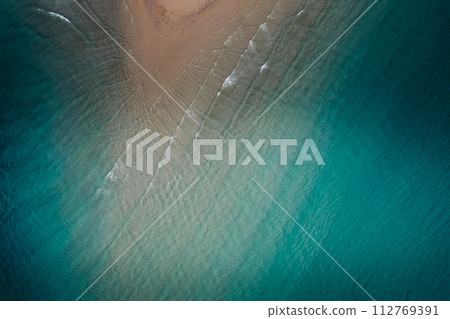 Beach and sea in the evening, high angle view Beach and sea in the evening, high angle view 112769391