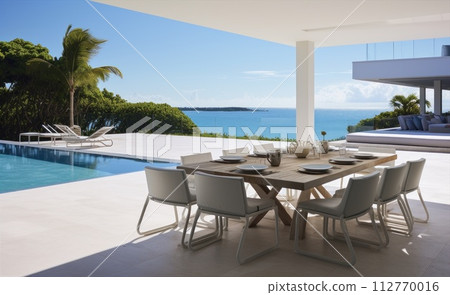 Outdoor furniture set overlooking water with ocean views 112770016
