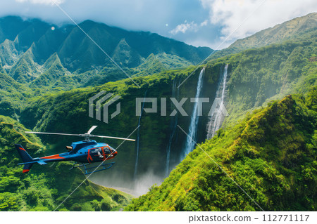 Helicopter tours above majestic waterfalls amidst vibrant green mountains 112771117