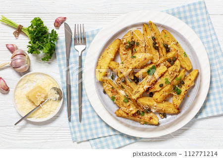 greek lemon potatoes with garlic, cheese, capers 112771214