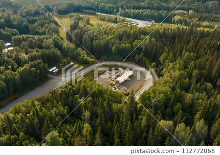 Aerial View of Hydrogen Energy Plant in Forest 112772068