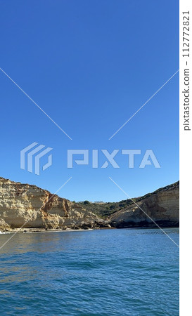Beautiful view of Benagil Cave in Carvoeiro Algarve Portugal Beautiful view of Benagil Cave in Carvoeiro Algarve Portugal 112772821