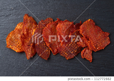 Mix of dried meat Jerky . From chicken , beef and pork. Mix of dried meat Jerky . From chicken , beef and pork. 112772882