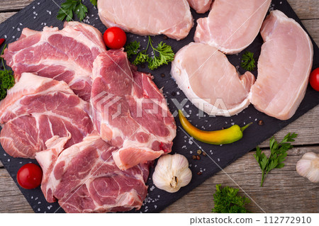 Steak from raw pork neck 112772910