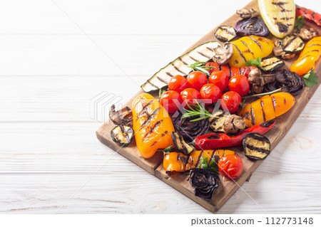 Colorful grilled vegetables on a pan barbecue 112773148