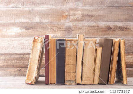Collection of old books in library Collection of old books in library 112773167