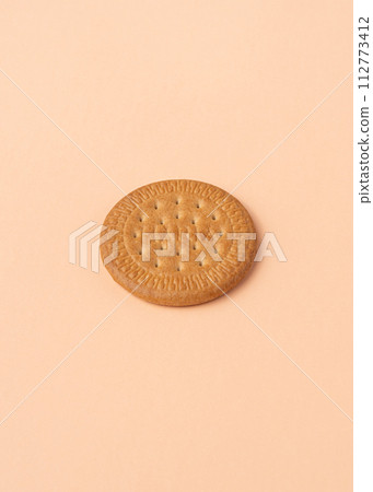 Maria biscuit on pink beige background.  112773412