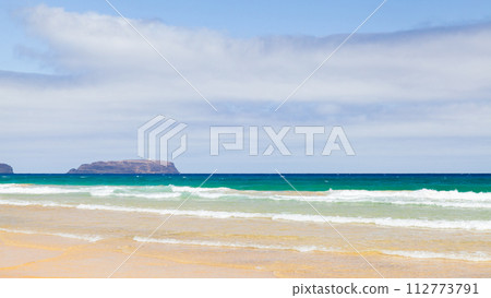 Empty sandy beach landscape on a summer day. Madeira, Portugal 112773791