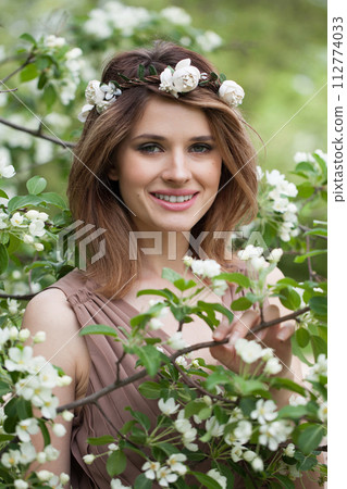 Smiling fashion model outdoors portrait. Healthy beauty woman Smiling fashion model outdoors portrait. Healthy beauty woman 112774033