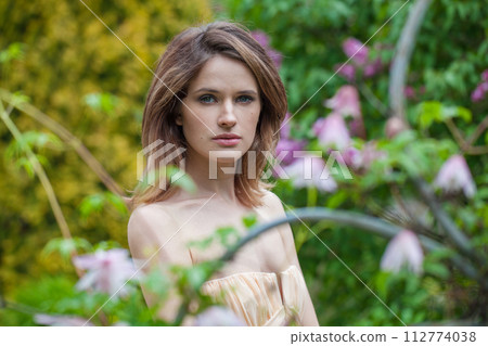 Fashionable spring woman enjoying nature outdoor, fashion beauty portrait Fashionable spring woman enjoying nature outdoor, fashion beauty portrait 112774038
