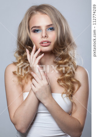 Cute blonde beauty. Young woman portrait Cute blonde beauty. Young woman portrait 112774289