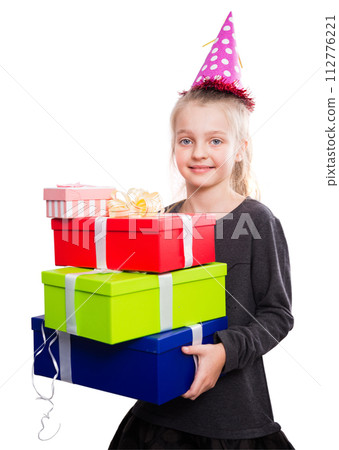 Child with a lot of gift boxes in hands on isolated background Child with a lot of gift boxes in hands on isolated background 112776221