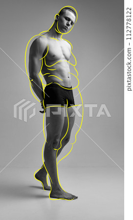 Weight loss. Full-length image of muscular, athletic young man with overlined body in underwear. Black and white image Weight loss. Full-length image of muscular, athletic young man with overlined body in underwear. Black and white image 112778122