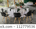 food and drinks on the wedding table in the restaurant at the banquet 112779536
