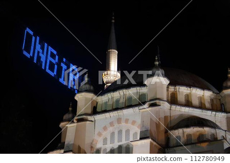 A large big mosque with a blue sign A large big mosque with a blue sign 112780949