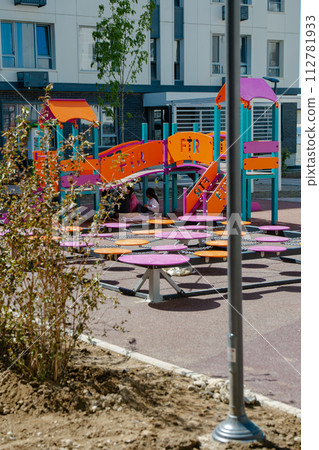 Colorful Playground Equipment for Kids to Enjoy in a Safe Environment 112781933