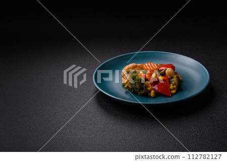 Delicious healthy vegetables steamed carrots, broccoli, asparagus beans and peppers Delicious healthy vegetables steamed carrots, broccoli, asparagus beans and peppers 112782127