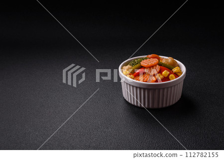 Delicious healthy vegetables steamed carrots, broccoli, asparagus beans and peppers Delicious healthy vegetables steamed carrots, broccoli, asparagus beans and peppers 112782155