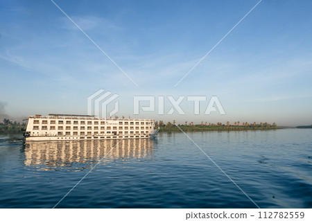 Nile River Encounter: Contrasting Cruise Ships Egypt Summer Travel Nile River Encounter: Contrasting Cruise Ships Egypt Summer Travel 112782559