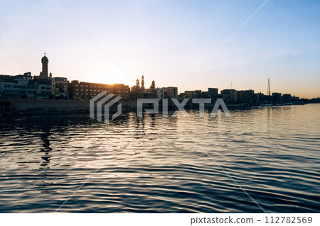 Nile River Serenity: Luxor Port at Dawn 112782569