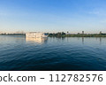 Nile River Encounter: Contrasting Cruise Ships Egypt Summer Travel 112782576