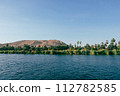 Majestic Nile Shoreline: Forest from the Cruise Ship. Egypt Summer Travel 112782585