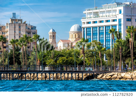 View of Limassol seafront with Ayia Napa cathedral on background. Cyprus 112782920