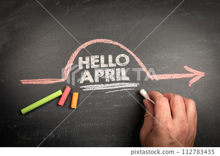 HELLO APRIL. Text on a dark chalkboard background HELLO APRIL. Text on a dark chalkboard background 112783435