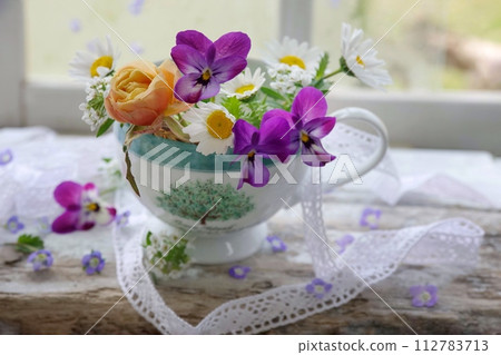 Roses and violas Roses and violas 112783713