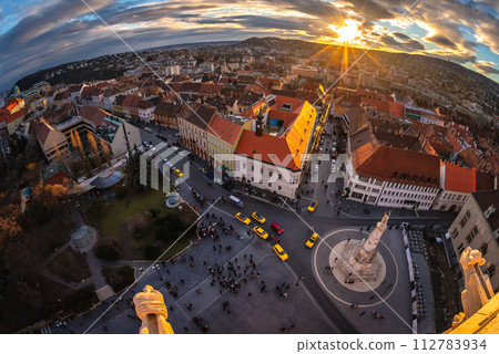 Matthias Church square with the Holy Trinity Column and bunch of tourists Matthias Church square with the Holy Trinity Column and bunch of tourists 112783934