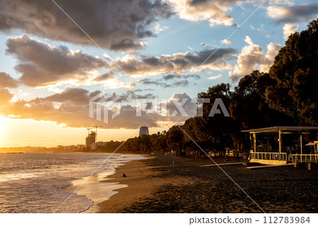 Dasoudi beach at sunset. Limassol, Cyprus Dasoudi beach at sunset. Limassol, Cyprus 112783984