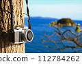Sea view and camera 112784262