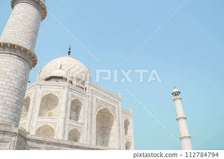 Front view of majestic Taj Mahal in Agra. One of seven wonders of the World Front view of majestic Taj Mahal in Agra. One of seven wonders of the World 112784794