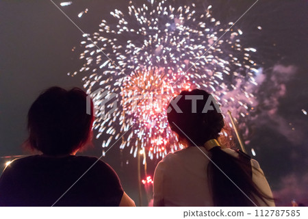 Watching fireworks Watching fireworks 112787585