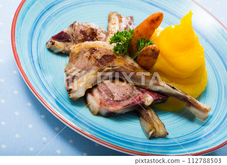 Steamed lamb with mashed rutabaga and carrots Steamed lamb with mashed rutabaga and carrots 112788503