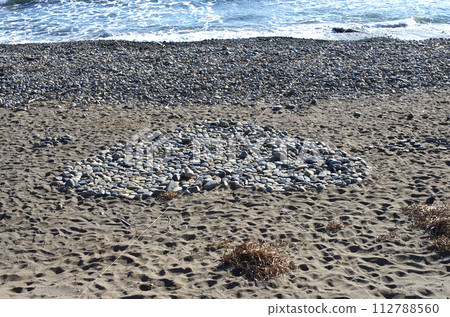 As I was walking along the beach, I found a large heart-shaped stone pile. A gift for someone you love? As I was walking along the beach, I found a large heart-shaped stone pile. A gift for someone you love? 112788560