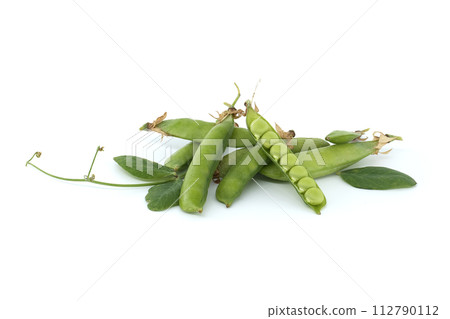 Pea pod is open and green peas inside over white background Pea pod is open and green peas inside over white background 112790112