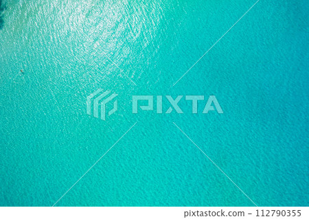 Clear blue sea on the island from above Clear blue sea on the island from above 112790355