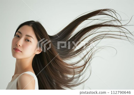 Profile photo of a beautiful Japanese woman with black hair (hair care, long hair, hair straightening, straight, no background) 112790646