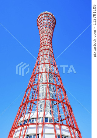 Kobe Port Tower under sunny skies in Kobe City 112791109